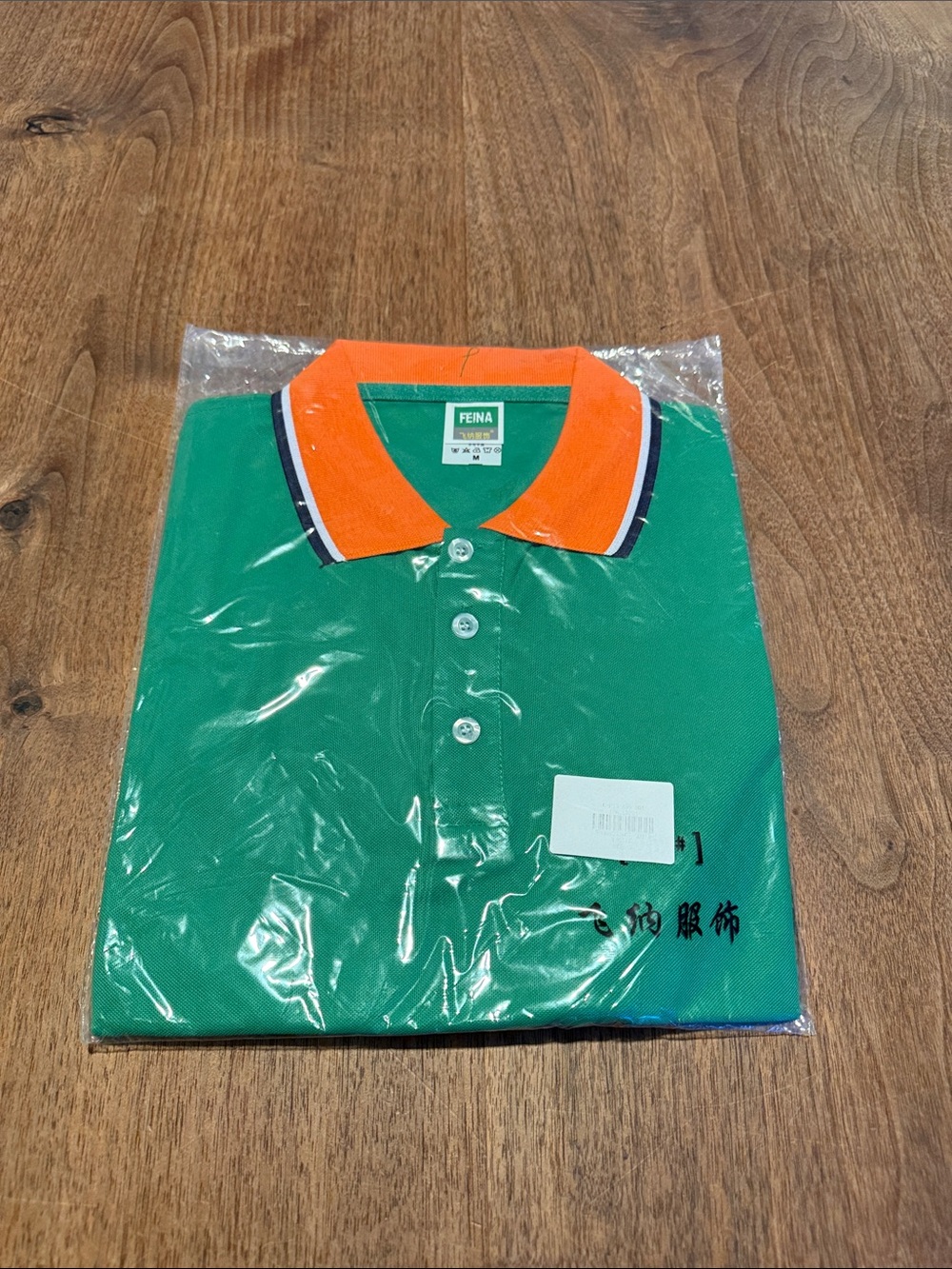 *NWT* FEINA Polo - M